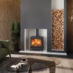 Stovax Huntingdon 40 with tracery door installed in a fireplace
